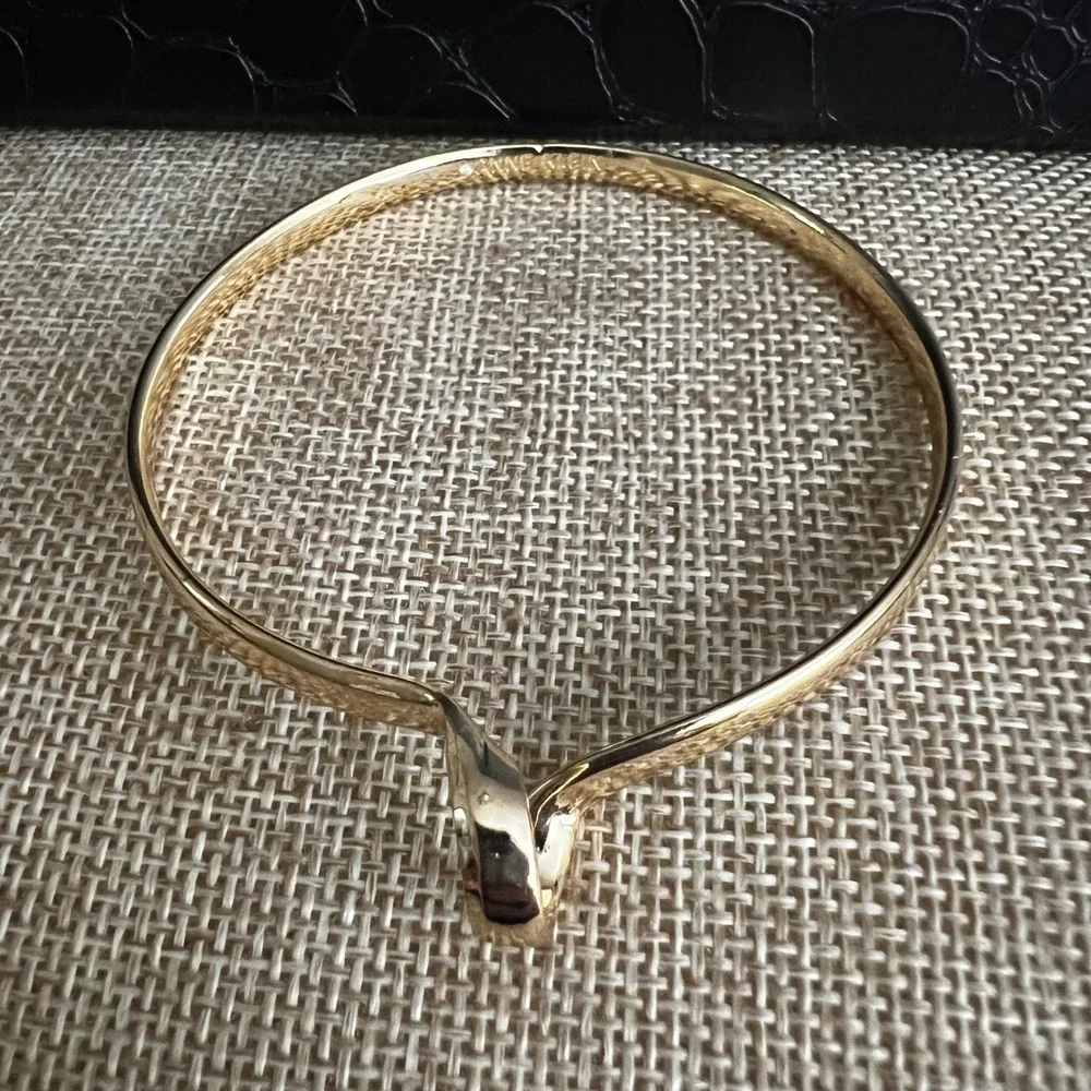 Anne Klein Gold Tone Knot Bangle Bracelet Size 7.75 Minimalist